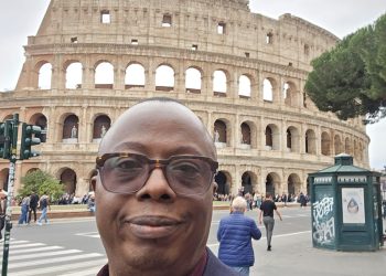 The author at the colosseum in Rome
